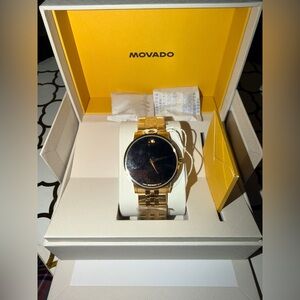 Swiss Movado Gold Timepiece with Black Face